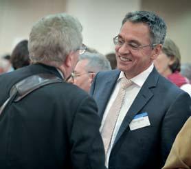 Marwan Lahoud (centre) mingles with