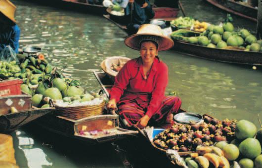 Floating produce market in Thailand with more subtle flavors. Some Vietnamese dishes might seem more like salads than main dishes to most Americans.