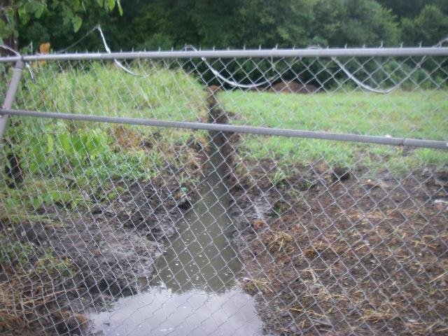 County Photographer: Jeff Tyler Witness: None Photo # 3 Of 4 Date: 07-21-09 Time: 1045 Description: Outfall from parking lot with