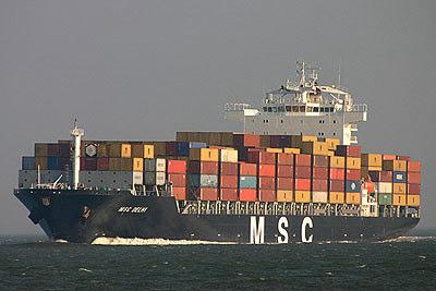 MSC Delhi, the second ship of Shanghai Shipyard s 3,554 TEU series, on the river Scheldt.