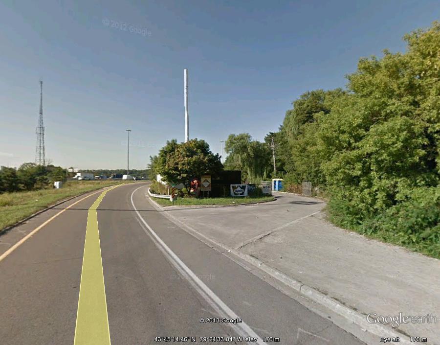 left turn ramp has only 40 metre radius (they lower the speed limit on ramp to 30 km/hr). And since there are no signalized intersections, this is a free-flowing Michigan left turn.
