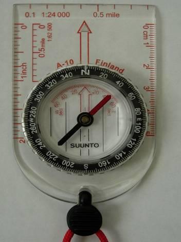 Step 1. Align Direction of Travel Arrow and Arrow Box on compass.