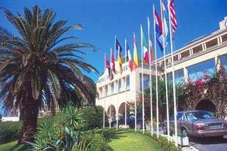 TOURISTIC LTD CORFU The island of Corfu in the Ionian Sea has always been known as a cosmopolitan resort due to its sandy beaches, wooded mountains and