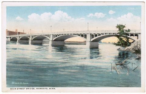 3. Main Street and Veteran s Memorial Bridge: Mankato s first bridge, built in 1879, was an iron truss bridge that could turn parallel to the river.
