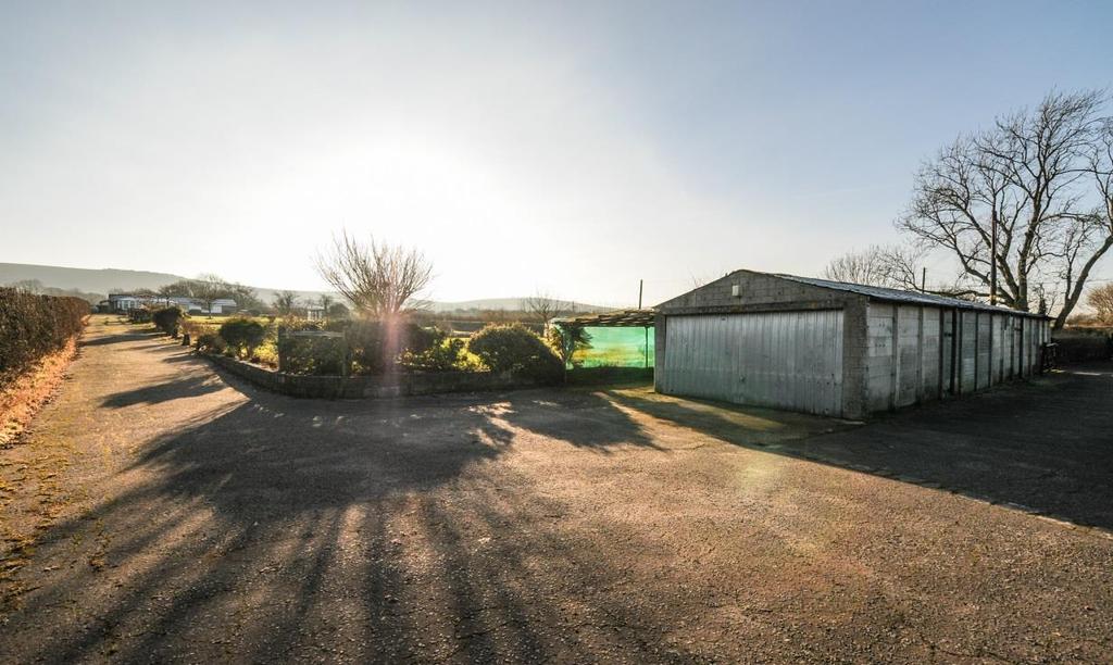 32 Ha) VIEWING STRICTLY BY APPOINTMENT WITH H J BURT Description Hillbrook comprises a detached 3 bedroom bungalow understood to have been built in the early 1970's and comes to the market for the