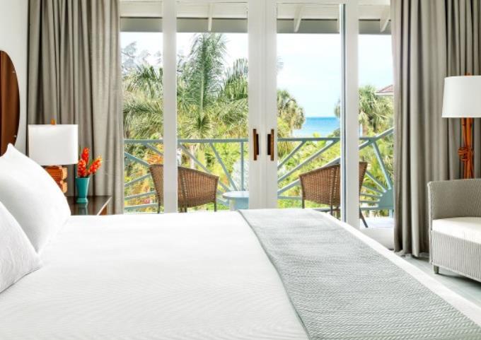 Deluxe Ocean - One king bed; chic Jamaican decor; balcony or