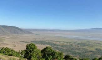 Almost immediately after we leave camp we have a steep climb up the Rift Valley escarpment; from the top we have an amazing view of Lake Manyara National Park lying below us, the lake glistening in