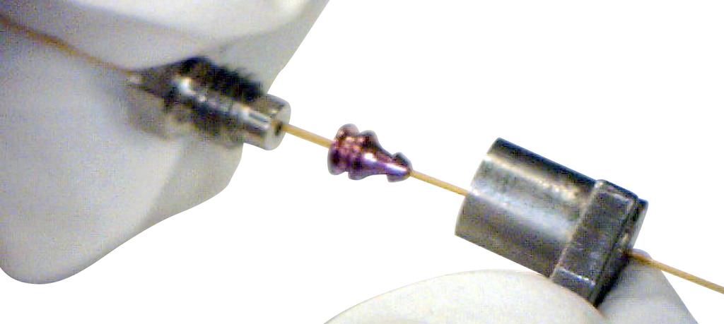 2 Pass the column end through the internal nut, the ferrule, and the swaging wrench (Figure 3).