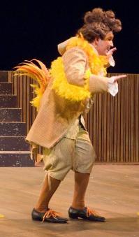 Tamino meets Papageno When Tamino awakes he sees a man covered in