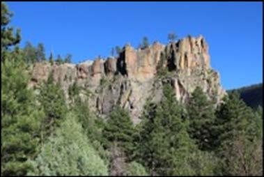 Adventurous hikers can face the challenge of Battleship Rock as numerous trails extend from the parking area.