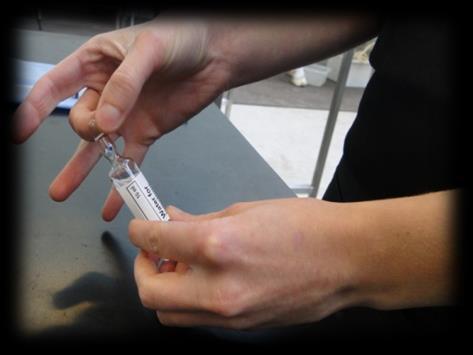 (attach the capped needle to the syringe using an aseptic technique - refer to