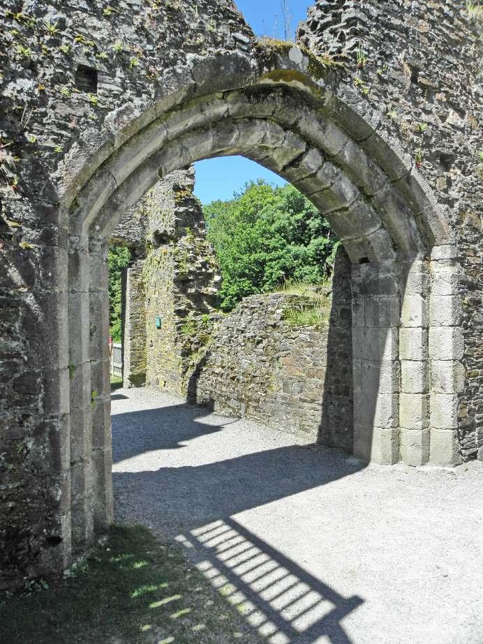 Fig. 12. Restormel Castle. From the interior side of the gatehouse looking out toward the drawbridge tower.