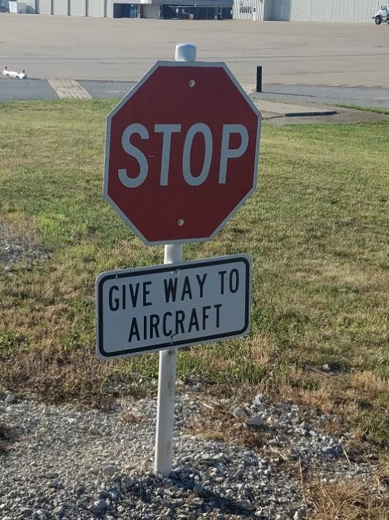 Vehicle Road entering a Taxilane. Vehicle Road entering a Runway or Vehicle Road entering Stop and Give Way to Aircraft a Runway Safety Area. Stop and get a taxiway. Before continuing.