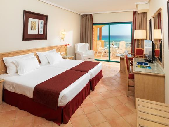 Rooms The large, bright rooms at the H10 Sentido Playa Esmeralda are equipped with all the amenities you could need for a comfortable stay: LCD TV with international channels Minibar ($ according to
