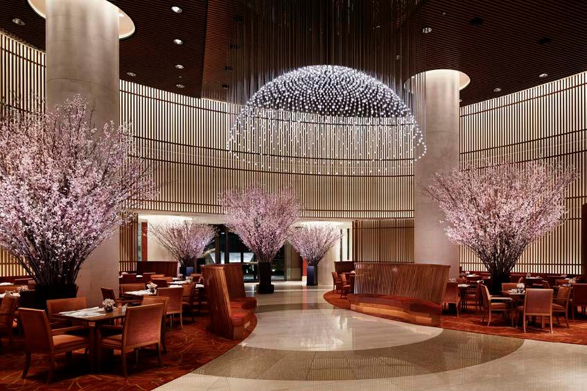 CHERRY BLOSSOM SEASON AT THE PENINSULA TOKYO 2 By day, Tokyo and the world pass under the lobby s cherry-blossom-like-clouds while being serenaded by traditional Japanese koto music, and by night are