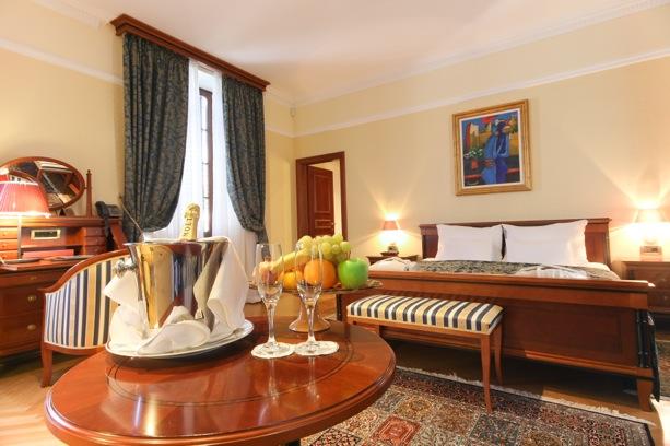Lorem Boutique Ipsum Hotel Kazbek Laid-back luxury3 KAZBEK SUITE Harmoniously divided into two separate spaces, the Kazbek Suite features a sitting area and separated cozy bedroom and is 45 meters