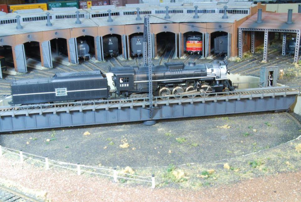 A double ended staging yard and two additional yards keep mainline track busy with freight, local and passenger service.