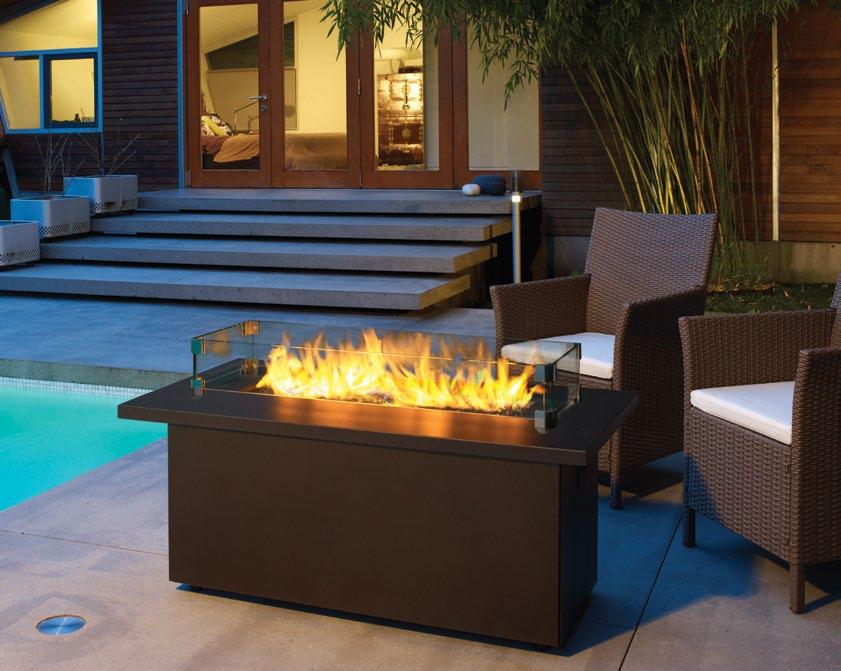 Regency Plateau PTO30CFT coffee firetable shown with sunset bronze top, crystals and glass wind shield.
