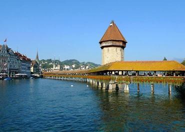 Proceed to Luzern city tour with walk over in Famous Chapel Bridge and beautiful streets