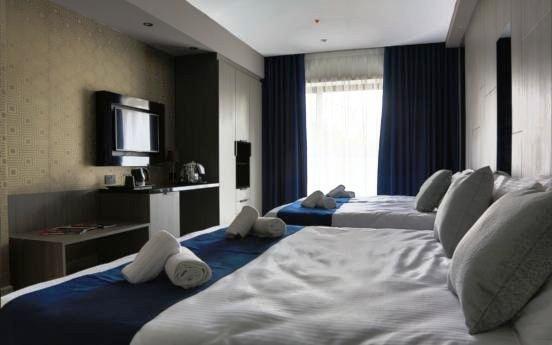 Each elegantly-designed bedroom has its own private balcony, is air-conditioned and fitted with a flatscreen TV.