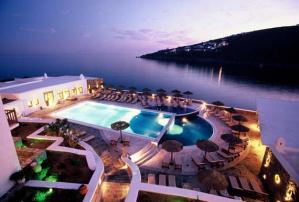 Gialos****superior Location: on a private peninsula in Platis Gialos, on the beach, 3.