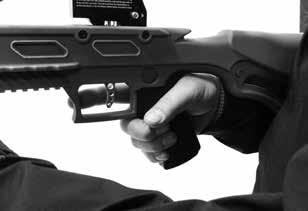 Figure 15 Fingers below finger/thumb guard Placement of Right Hand In all shooting positions the the right hand is used to grasp and firmly grip the pistol grip that is located immediately behind the