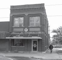 It is an historic building (a bank at one time) on the south end of the east side of the village square.