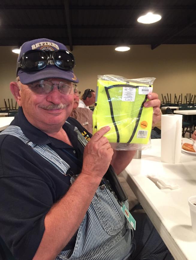 Left Gary Potter recently bought some florescent vests at a yard sale and has donated them to the Chapter.