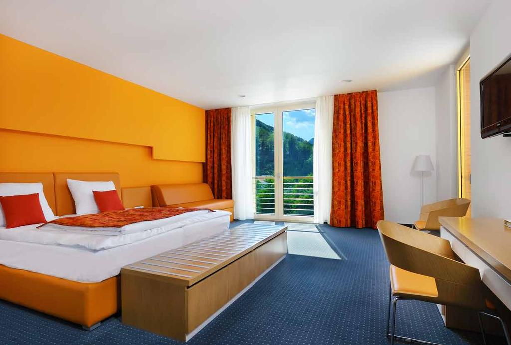 In harmony with colours and nature ROOMS FULL OF AMENITIES The following awaits you in the pleasant ambience of our hotel: rooms with state-of-the-art equipment and of modern interior design: a