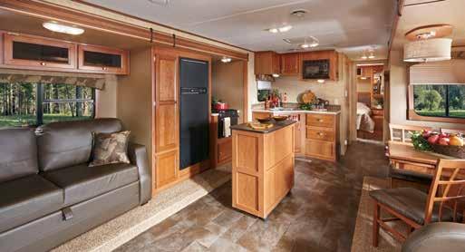 Kitchens include a Norcold 6-cubic foot refrigerator, range with