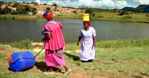 communities. Traditional methods of collecting water include carrying heavy five gallon buckets on the head. Over time these heavy loads place an enormous strain on their bodies.