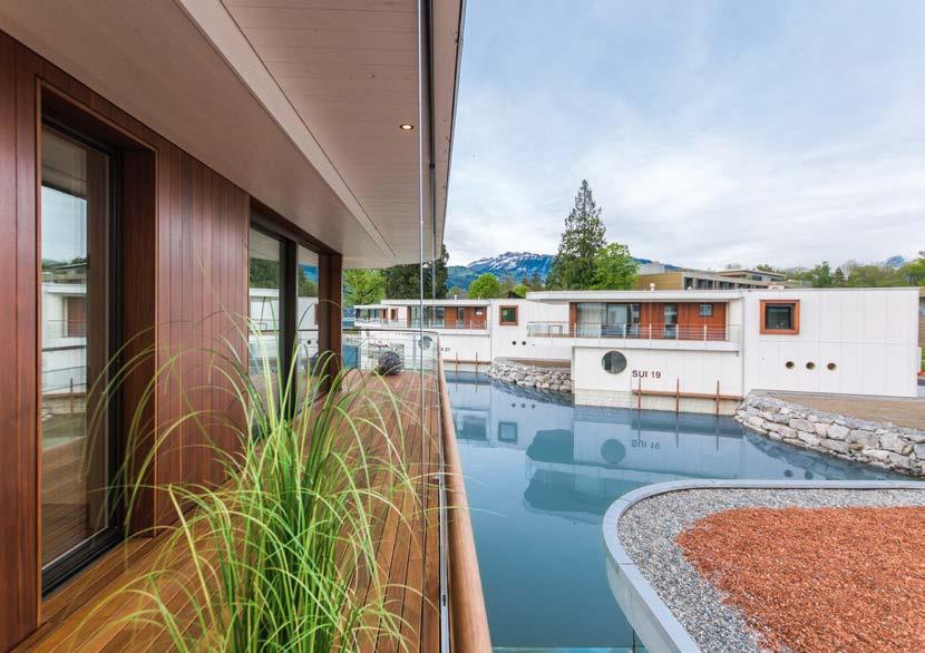 Luxury Villas on Lake Thun Upscale lakeside villas located on a lagoon - with an integrated