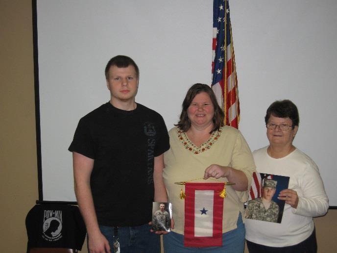 Auxiliary Presents Blue Star Banner Pictured from left to right: Brother Michael Milner, Mother Loretta Milner, Grandmother Rosalind Baker Ava Gift, President of Antietam Unit 236 Sharpsburg American