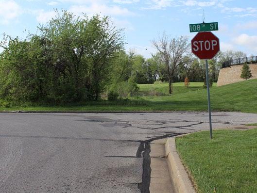 railroad tracks already has protected walkways along both directions of traffic If further development occurs along Strang Line Road, developer could be required to assist