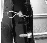 The hoist lift support clips need to seat inside the center hole of the tire rim. The valve stem of the tire MUST be pointed in the up position or toward the bottom of the RV.