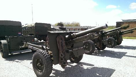 are training to assist in the showing and firing of 4 x 25 pounder howitzers.