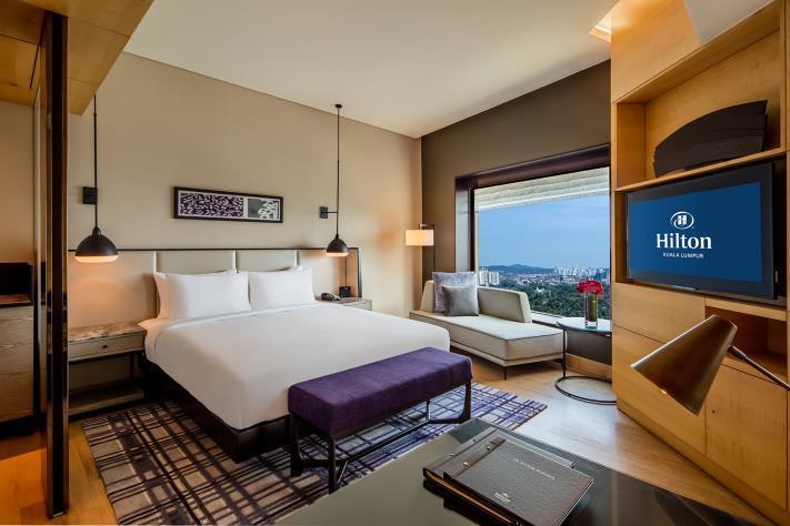 ROOM ACCOMMODATION ROOM TYPE Deluxe Plus 48-59sqm, 25% larger room, floor to ceiling window, Hilton Serenity Bed
