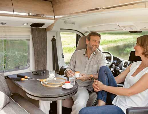 The van is prepared to make you feel comfortable. Four persons can comfortably take place in the cosy seating group.