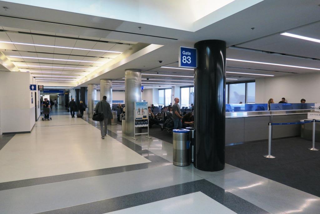 Gate 83, at right, has reopened in Terminal 8 while renovation work continues in the men's and family restrooms at left.