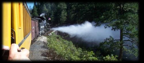While crossing Grand Trestle the engineer took the opportunity to blow residual water out of the pistons.