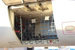 Luggage goes up conveyor belt 43