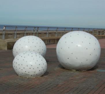View the sculpture and catch the bracing Blackpool air.