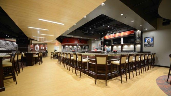 The room offers seating for 150 patrons, 18 high definition flat screen TV s, a full service bar, and a food serving line all while honoring the tradition of
