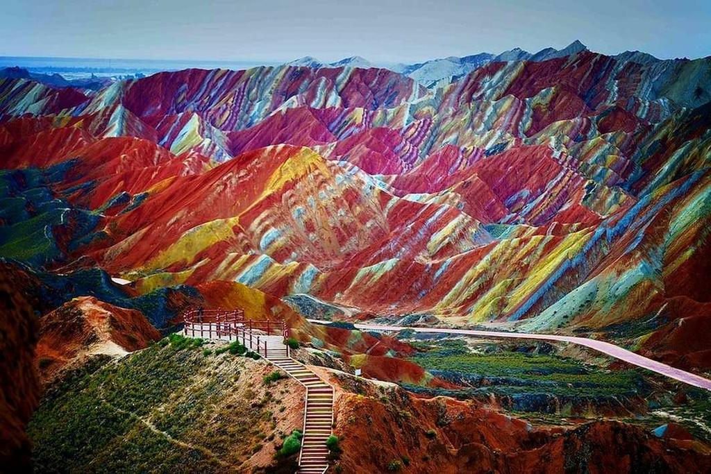 P a g e 1 0 Photo Feature Danxia Landform, South-west China The Danxia landform refers to various landscapes found in southeast, southwest and northwest