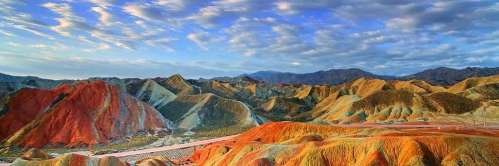 Danxia landform is formed from red-coloured sandstones and conglomerates of largely Cretaceous age.