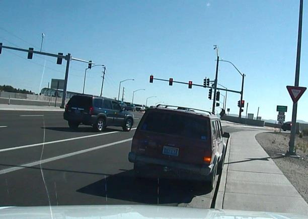 Sergeant Mike Wright and Deputy Dennis Allen attempted to conduct a traffic stop on the vehicle on North McCarran Boulevard between Clear Acre Lane and the southbound on-ramp to I-580.