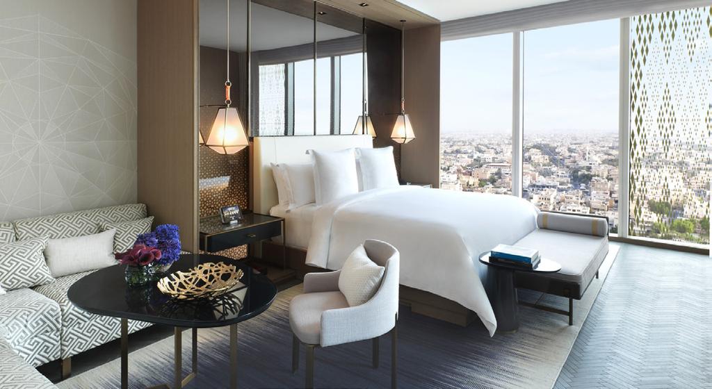RELAXATION AND PRODUCTIVITY Experience the city s largest, most sophisticated guest rooms and suites.