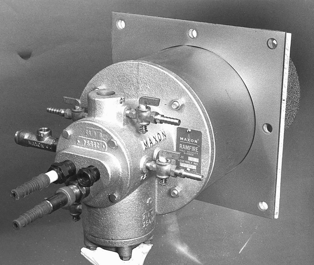 Page 4304 Accessory Options The photo below shows a RAMFIRE Burner with seal and support assembly, standard refractory block and spark ignitor assembly. Standard air inlet position is shown.