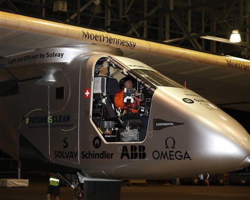Solar Impulse 2 solar plane flies out of the Kalaeloa Airport, in Solar Impulse 2