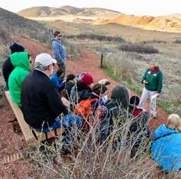 CONNECTING PEOPLE TO NATURE Visitors participate in a full moon hike at Devil s Backbone Open Space in April of 2015.